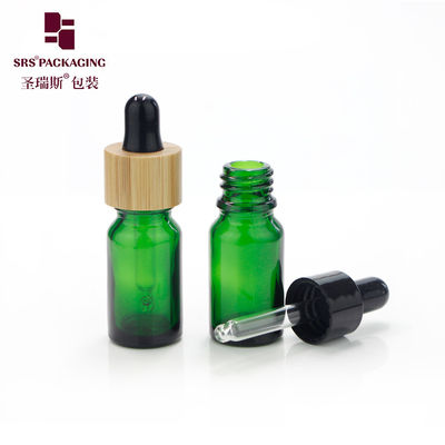 China 5ml in stock glass empty bamboo dropper small essential oil bottles supplier
